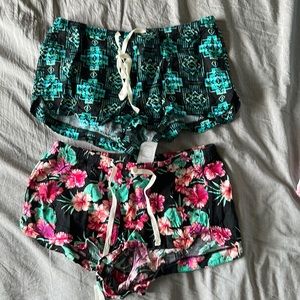Empyre shorts x 2 women’s size medium, black Hawaiian floral and teal motif